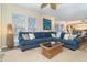Relaxing living room with sectional sofa, coffee table and coastal decor at 7482 Palm Island Dr # 2511, Placida, FL 33946