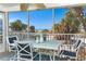 Enjoy ocean views from this screened balcony with patio furniture at 7482 Palm Island Dr # 2511, Placida, FL 33946