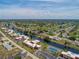 High-up aerial view of the community and surrounding golf course at 84 Boundary Blvd # 165, Rotonda West, FL 33947