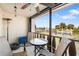 Relaxing balcony with a table, chairs, and scenic water views at 84 Boundary Blvd # 165, Rotonda West, FL 33947