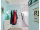 Beach-themed entryway with coat hooks and coastal decor at 84 Boundary Blvd # 165, Rotonda West, FL 33947