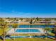 Aerial view of the tennis court and shuffleboard court at 84 Boundary Blvd # 165, Rotonda West, FL 33947