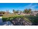 Backyard with canal and neighbor's houses at 9230 Griggs Rd, Englewood, FL 34224