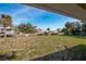 Spacious backyard with canal view at 9230 Griggs Rd, Englewood, FL 34224