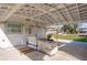 Under-construction carport with building materials at 9230 Griggs Rd, Englewood, FL 34224