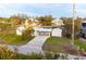 Single story home with carport and detached garage at 9230 Griggs Rd, Englewood, FL 34224