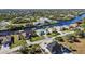 Waterfront community showcasing various homes and canals at 9567 Honeymoon Dr, Port Charlotte, FL 33981