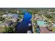 Aerial view of waterfront homes and community at 9567 Honeymoon Dr, Port Charlotte, FL 33981