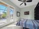 Guest bedroom with water view and built-in Murphy bed at 9567 Honeymoon Dr, Port Charlotte, FL 33981