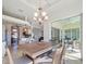 Bright dining area with table and chairs near kitchen at 9567 Honeymoon Dr, Port Charlotte, FL 33981