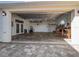 Attached garage with workshop and plenty of storage space at 9567 Honeymoon Dr, Port Charlotte, FL 33981