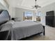 Main bedroom with water views and large walk-in closet at 9567 Honeymoon Dr, Port Charlotte, FL 33981