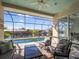 Relaxing screened pool and patio area with canal view at 9567 Honeymoon Dr, Port Charlotte, FL 33981