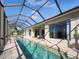 Screened pool area with canal view and plenty of sunshine at 9567 Honeymoon Dr, Port Charlotte, FL 33981