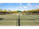 Community tennis courts with ample space for matches at 11241 Mc Dermott Ct, Englewood, FL 34223