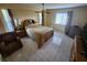 Bedroom with tile flooring, a bed, and a window with curtains at 1329 Sheehan Blvd, Port Charlotte, FL 33952