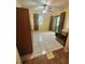 Spacious bedroom with tile flooring, ceiling fan, and sliding glass doors at 1329 Sheehan Blvd, Port Charlotte, FL 33952