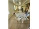 Florida room with seating area, ceiling fans, and tile flooring at 1329 Sheehan Blvd, Port Charlotte, FL 33952