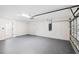 Spacious garage with epoxy floor and extra storage at 13442 Keystone Blvd, Port Charlotte, FL 33981