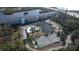 Aerial view of waterfront community with tennis court at 1401 S Mccall Rd # 306B, Englewood, FL 34223