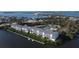 Aerial view of waterfront community with boat dock at 1401 S Mccall Rd # 306B, Englewood, FL 34223