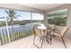 Relaxing balcony with water views and outdoor seating at 1401 S Mccall Rd # 306B, Englewood, FL 34223