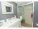 Clean bathroom with single sink vanity and shower at 1401 S Mccall Rd # 306B, Englewood, FL 34223