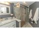 Modern bathroom with a large walk-in shower at 1401 S Mccall Rd # 306B, Englewood, FL 34223