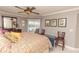 Spacious bedroom with a king-size bed and water views at 1401 S Mccall Rd # 306B, Englewood, FL 34223