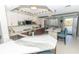Updated kitchen with island seating and stainless steel appliances at 1401 S Mccall Rd # 306B, Englewood, FL 34223