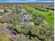 Several houses situated near a golf course at 14049 Willow Glen Ct # 242, Port Charlotte, FL 33953