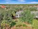 Aerial view of the home nestled in a lush landscape at 14049 Willow Glen Ct # 242, Port Charlotte, FL 33953
