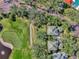Aerial view of two houses near a golf course at 14049 Willow Glen Ct # 242, Port Charlotte, FL 33953