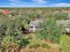 Aerial view showing home's location and landscaping at 14049 Willow Glen Ct # 242, Port Charlotte, FL 33953