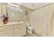 Bathroom with single vanity, toilet, and shower/tub combo at 14049 Willow Glen Ct # 242, Port Charlotte, FL 33953