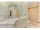 Clean bathroom with double vanity, shower stall, and toilet at 14049 Willow Glen Ct # 242, Port Charlotte, FL 33953