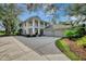 Two-story house with attached garage and landscaping at 14049 Willow Glen Ct # 242, Port Charlotte, FL 33953