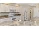 Well-equipped kitchen with stainless steel appliances at 14049 Willow Glen Ct # 242, Port Charlotte, FL 33953