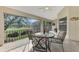 Enjoy this screened porch with a view of the golf course at 14049 Willow Glen Ct # 242, Port Charlotte, FL 33953