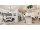 Bright dining area with views of the kitchen and stainless steel appliances at 171 Medalist Rd, Rotonda West, FL 33947