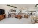 Inviting living room with comfortable seating and a clear view of the dining area at 171 Medalist Rd, Rotonda West, FL 33947