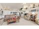 Open living area with high ceilings and a view of the kitchen at 171 Medalist Rd, Rotonda West, FL 33947