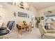 Comfortable living space with casual seating, a desk, and tasteful decor in a well-lit, inviting area at 171 Medalist Rd, Rotonda West, FL 33947