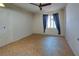 Bedroom with tile floors and ceiling fan at 1860 Bluebird Ln, Englewood, FL 34224