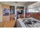 Bedroom with skull print blanket, wood floors, and built-in shelving at 1860 Bluebird Ln, Englewood, FL 34224