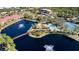 Community features pool, tennis courts, and pond at 23465 Harborview Rd # 1022, Punta Gorda, FL 33980