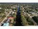 Expansive aerial view of canal-front homes and neighborhood landscape at 2397 Cannolot Blvd, Port Charlotte, FL 33948
