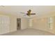 Bedroom features ceiling fan, recessed lighting, shutters, and ensuite access at 26098 Constantine Rd, Punta Gorda, FL 33983