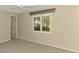 Bedroom with plantation shutters offers privacy and plenty of natural light at 26098 Constantine Rd, Punta Gorda, FL 33983