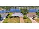 Beautiful home with well-maintained landscaping, mature trees, and convenient driveway at 26098 Constantine Rd, Punta Gorda, FL 33983